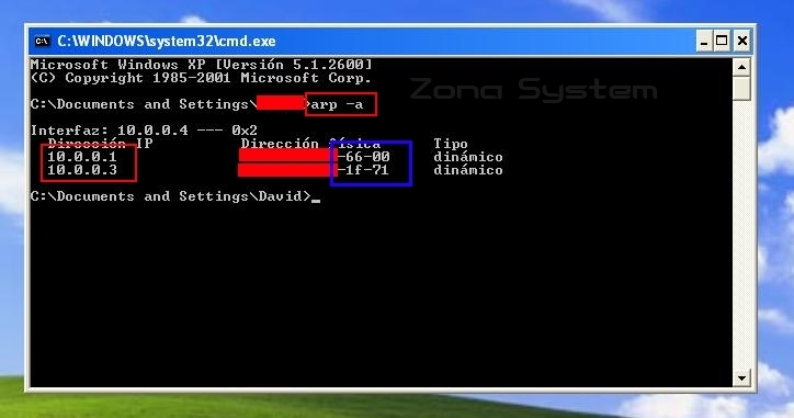 Figura 4: Consultando la tabla ARP de la víctima con las direcciones MAC originales.